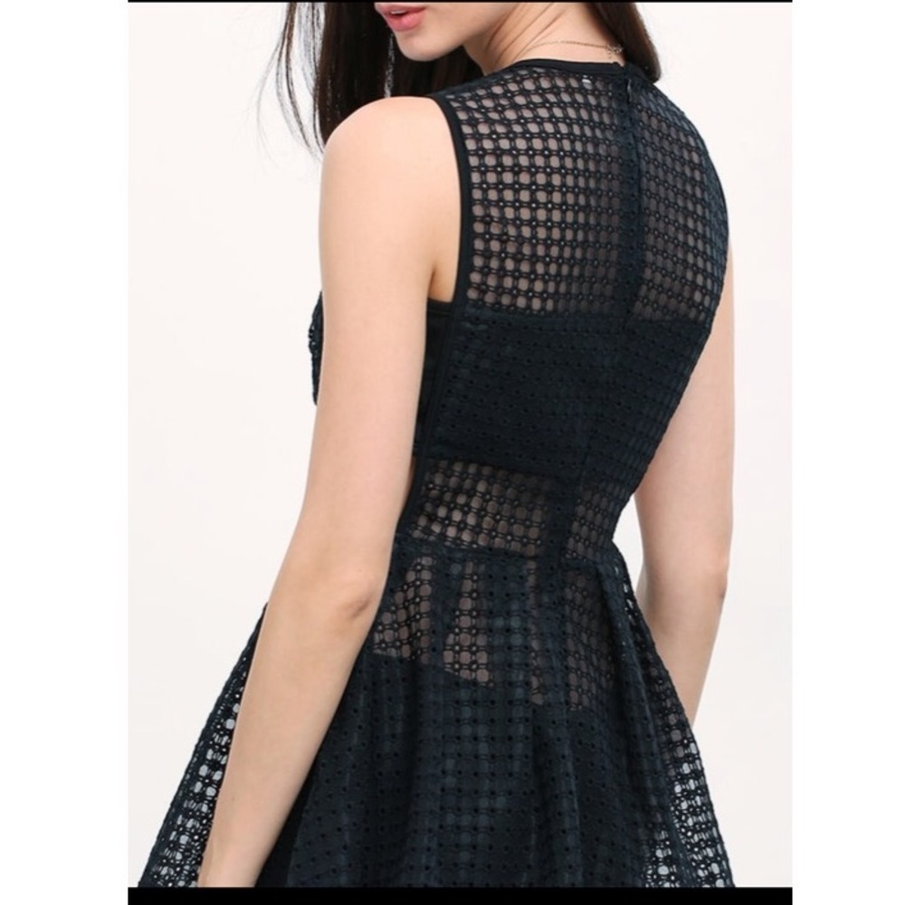 Eyelet Peplum Top